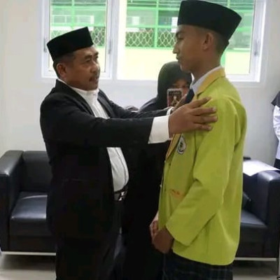 H. Pabelloi Lantik Pengurus OSIM MTsN 1 Polman Masa Bakti 2023-2024